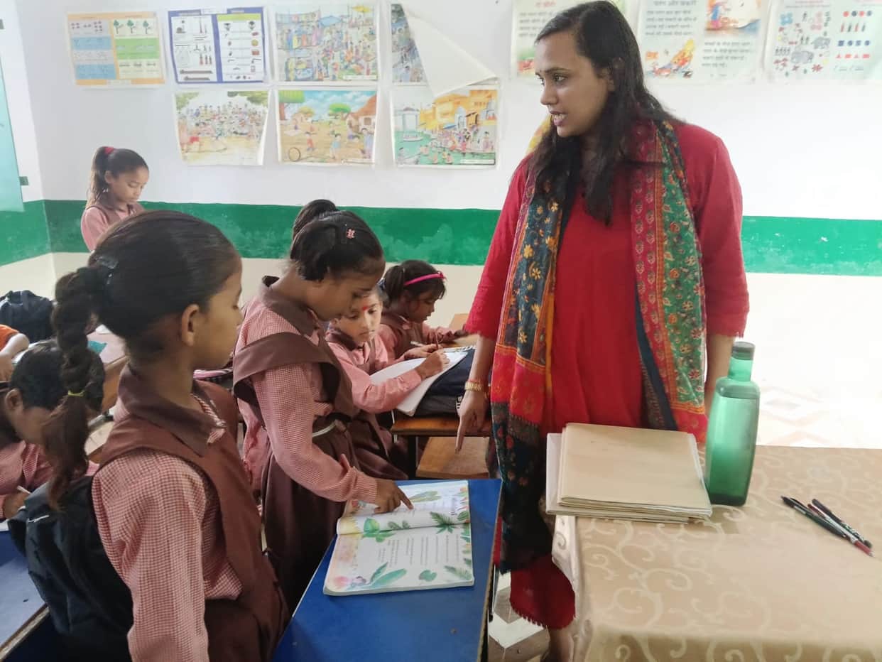 Two teachers and a Shiksha Mitra were found absent during the inspection, and their salaries were withheld for one day.