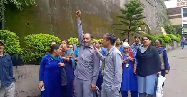 Sit-in protest at MMU Hospital over non-receipt of timely salaries.