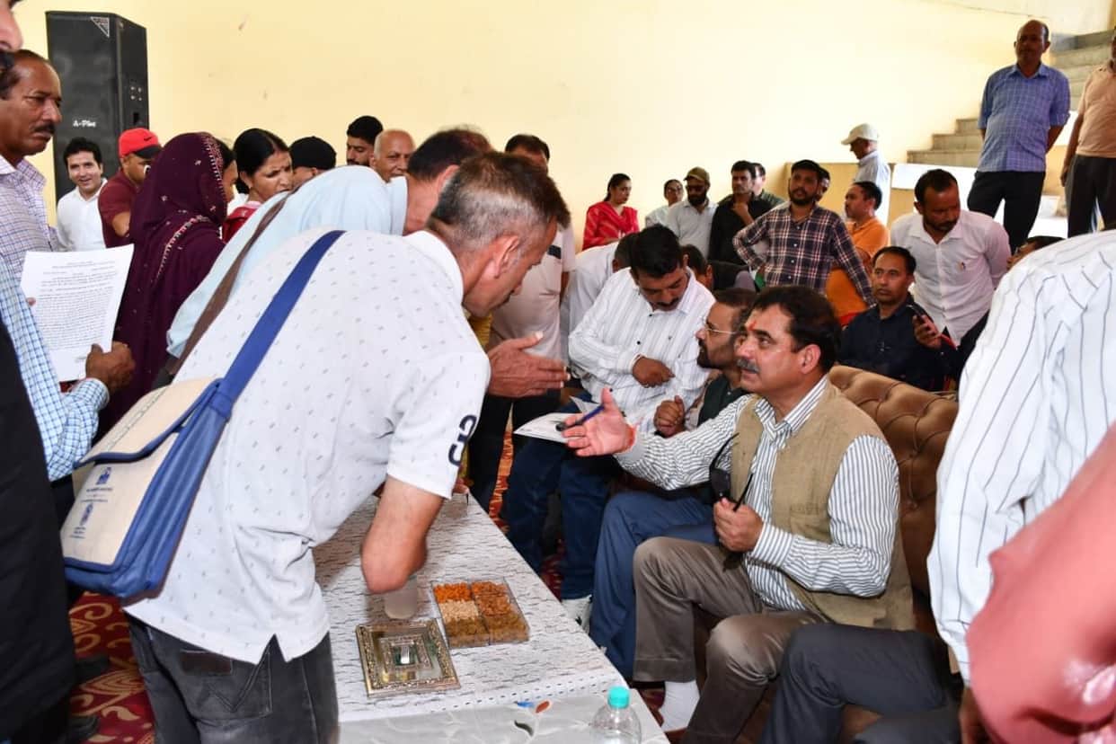 MLA hands over 14 e-rickshaws to panchayats; 318 development schemes discussed.
