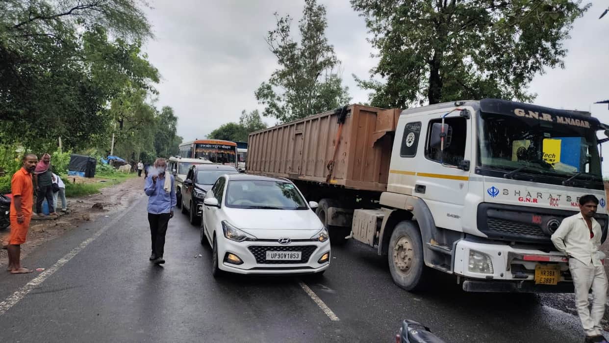 Villagers blocked the highway after rainwater flooded their homes.