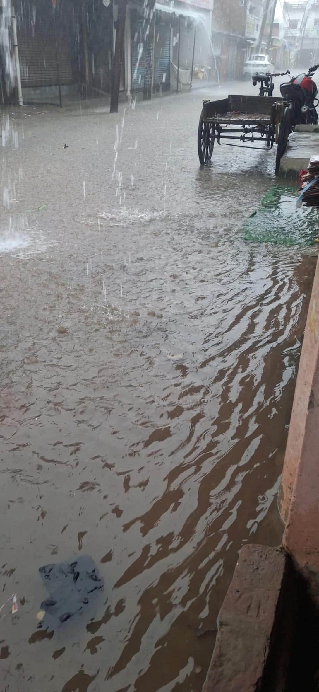 Drains clogged, waterlogging on roads.