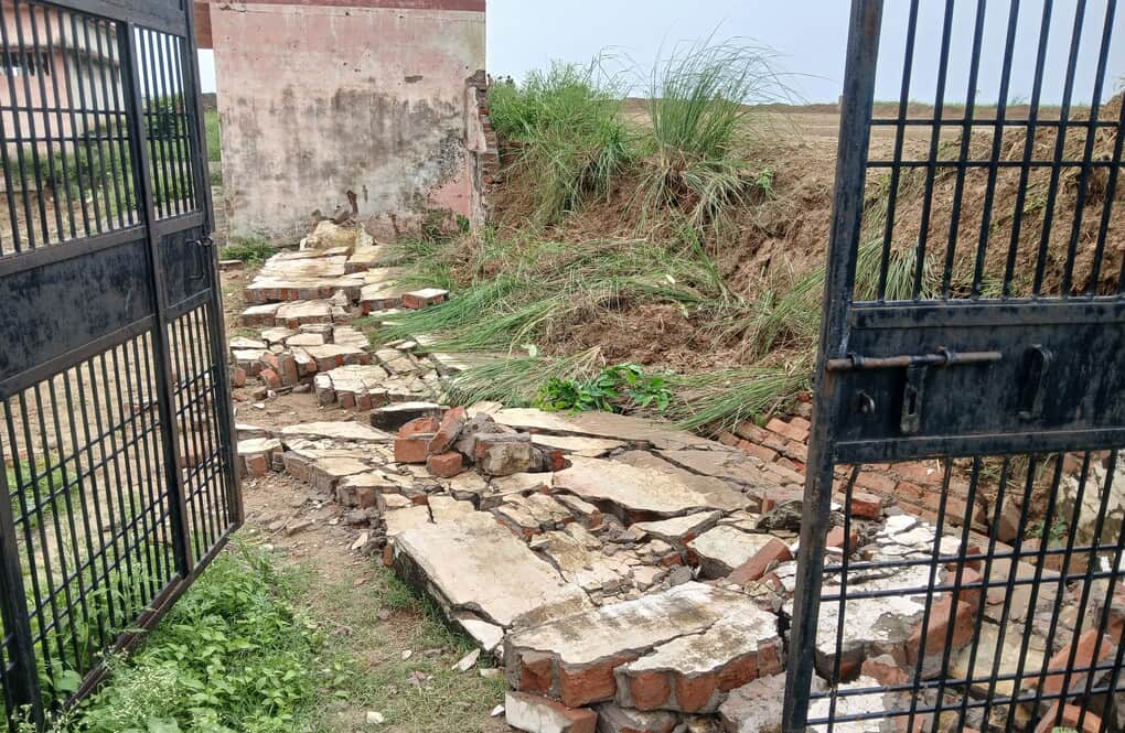 Boundary wall of cremation ground collapses due to storm and rain at night.