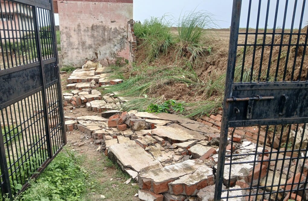 Boundary wall of cremation ground collapses due to storm and rain at night.