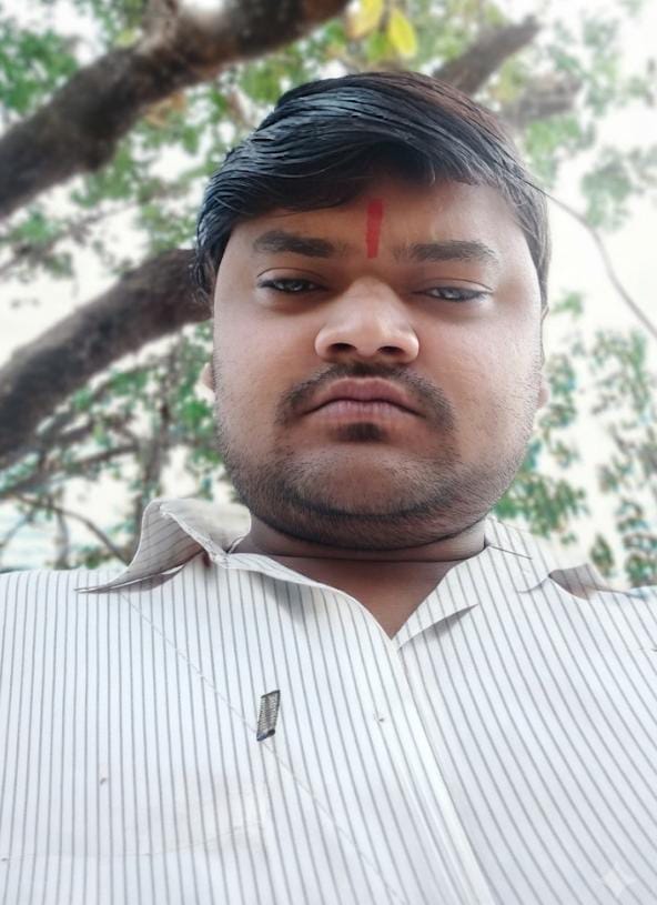 Body of a young man found lying by the roadside.