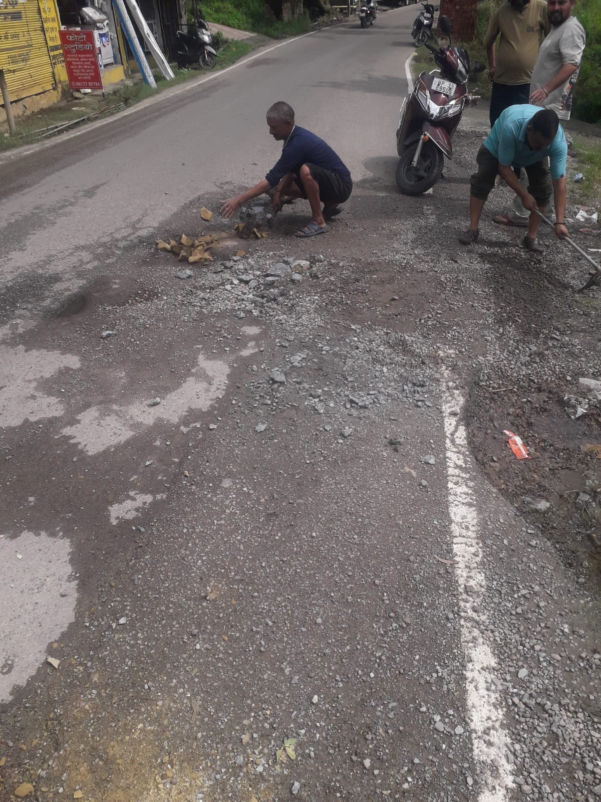 Those responsible kept turning a blind eye; people filled the potholes on the road themselves.
