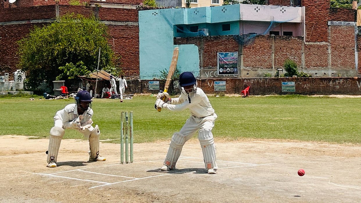 Mau defeated Ghosi by 37 runs, powered by Vijay's century.