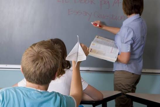 Teacher suspended for pushing student who refused to sweep.