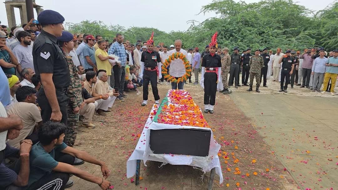 Martyr Ravi Prakash cremated with state and military honours; eight-year-old son Dev lit the funeral pyre