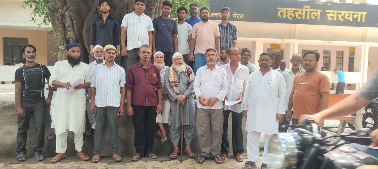 Allegations of locking the graveyard gate and obstructing burials; inquiry demanded.