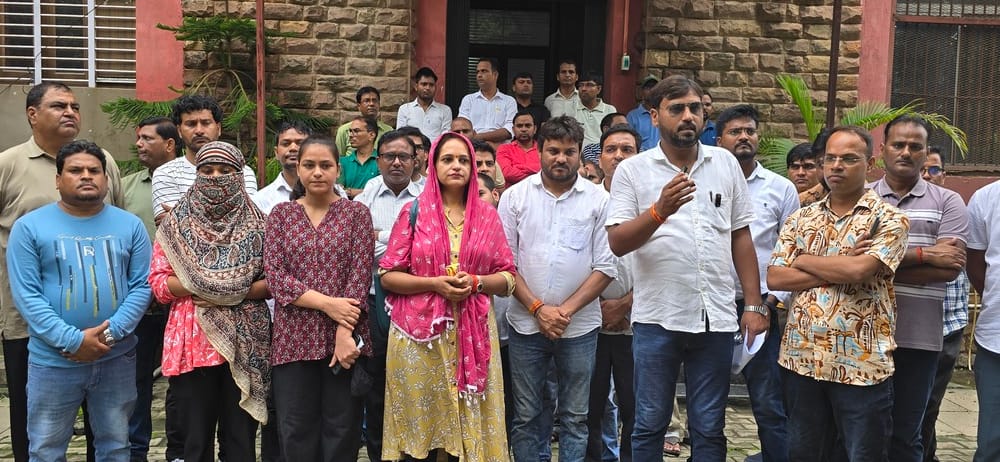 Protest demanding advertisements for 20,000 posts based on the old recruitment rules.