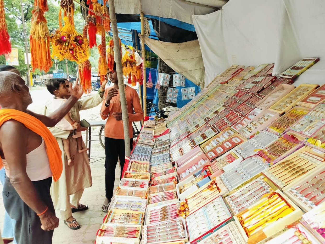 Markets decked up for Raksha Bandhan; shops abuzz with Rakhi displays.