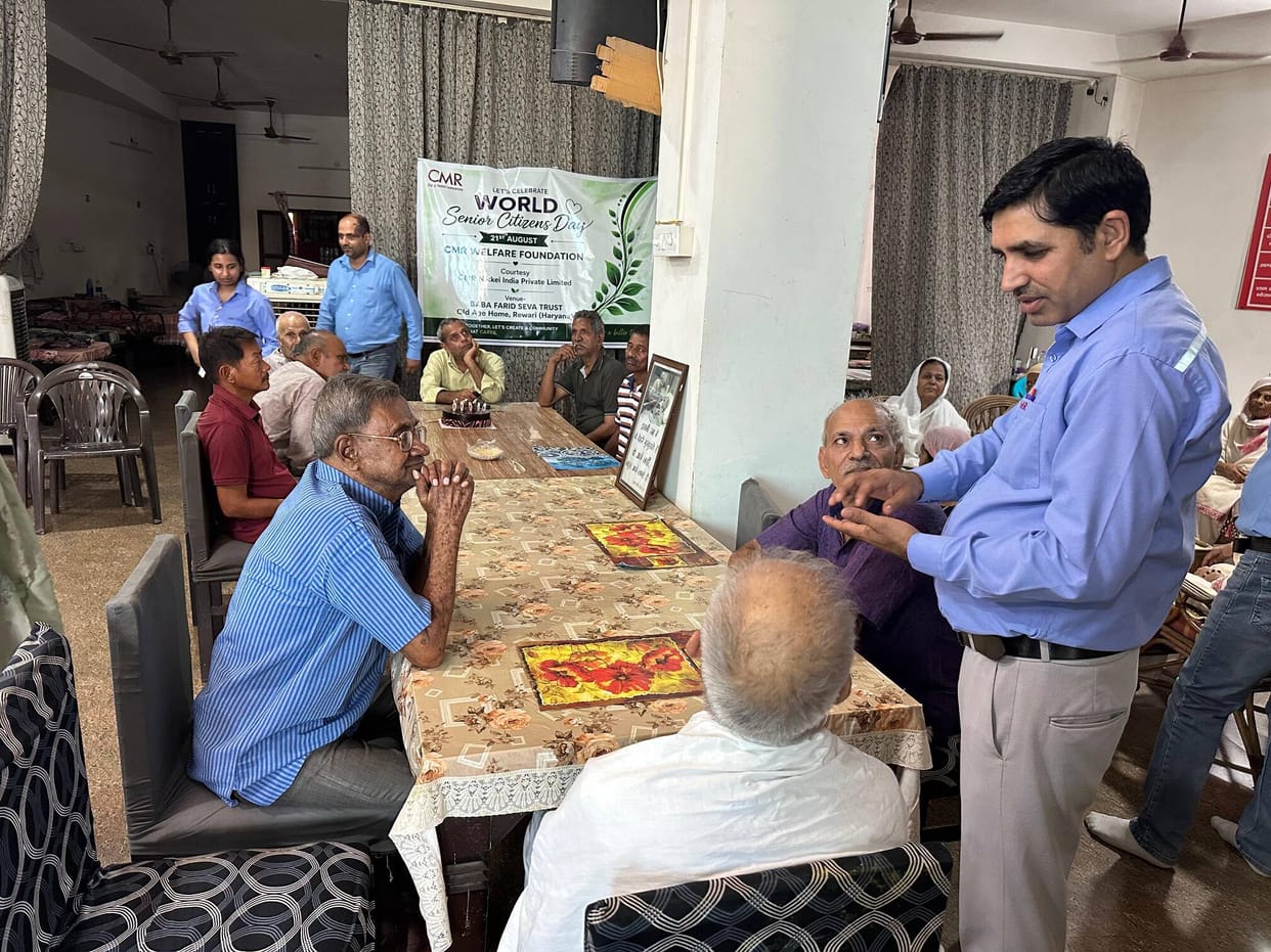 Shared moments of joy with the elderly at an old age home on Senior Citizens' Day.