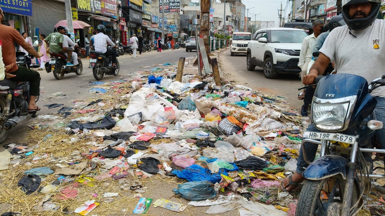 Sanitation services stalled for 16 days... residents distressed by the stench, smoke, and filth