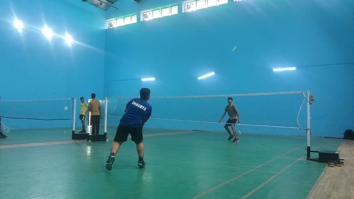 Badminton players showcase their talent to secure a place in the team.