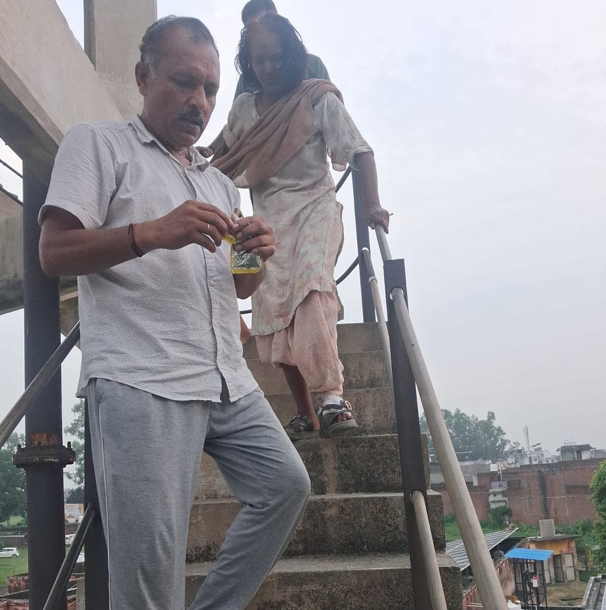 A woman has now climbed the water tank at the District Hospital, demanding the release of her nephew from jail.