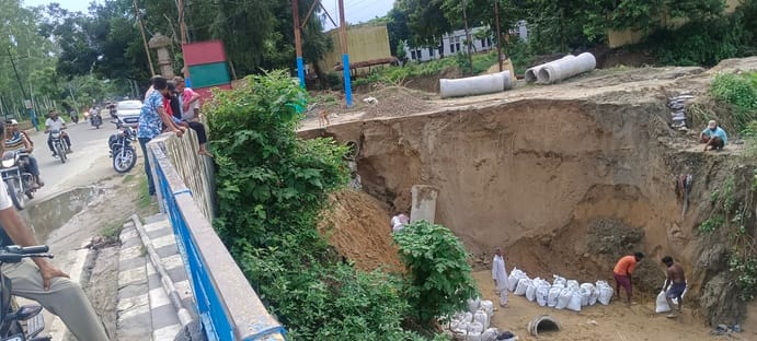 Erosion of the road continued for three days; the damage reached the main thoroughfare.