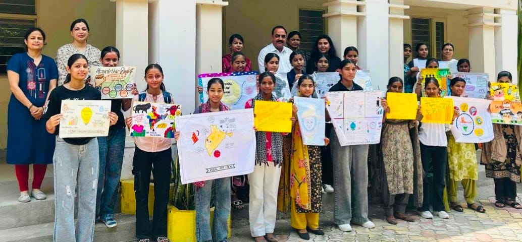 Mahak takes first place in the poster-making competition.