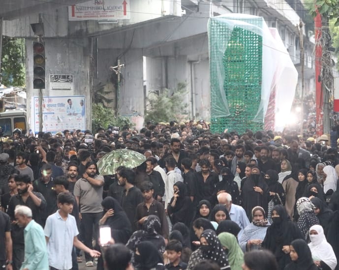 Mourners shed tears in the silent Taziya procession.