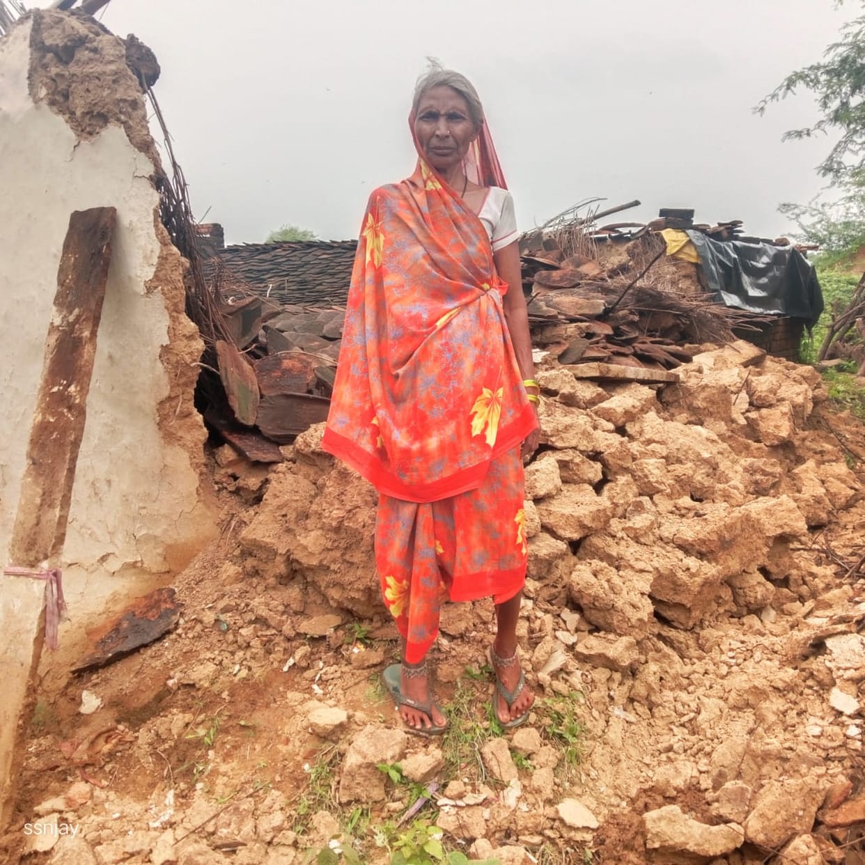 Three mud houses collapse due to rain; compensation demanded.
