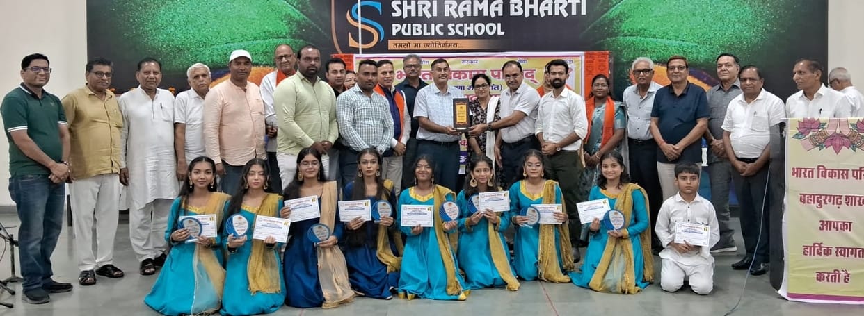 S.R. Century School takes first place in the group singing competition.