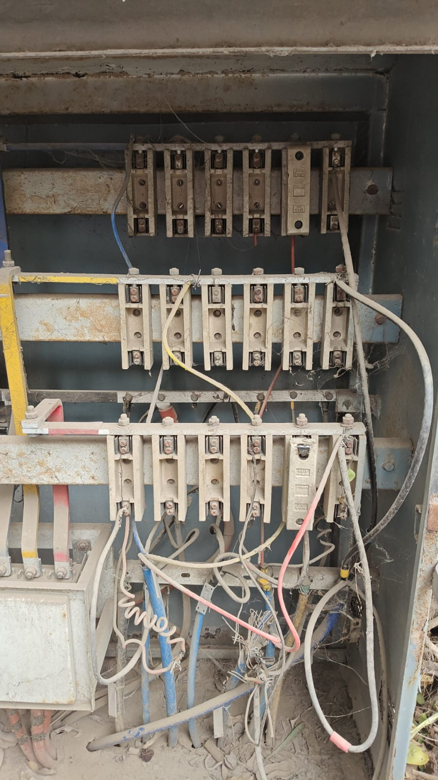Exposed electrical panel box; risk of accident.