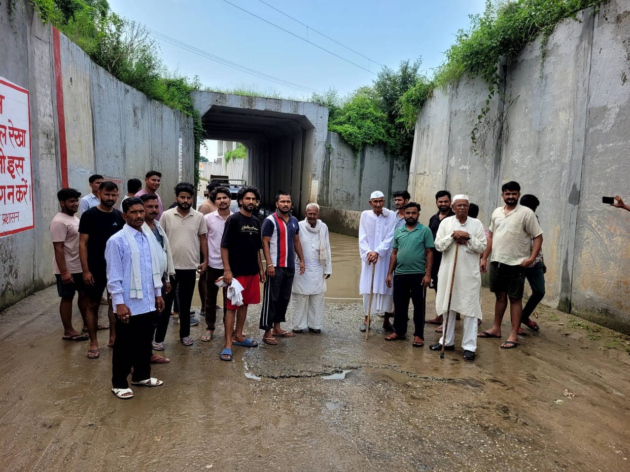 Villagers staged a protest over waterlogging in the underpass.