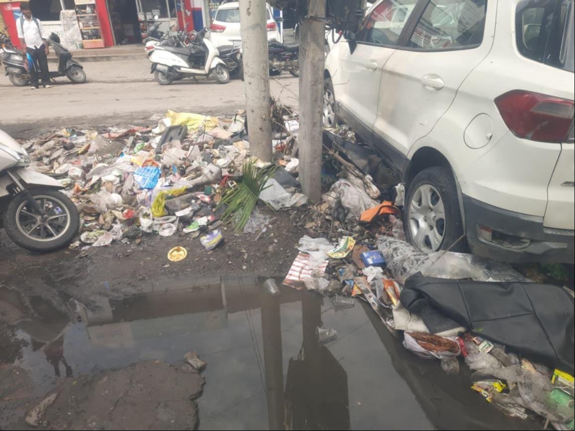 Business affected by garbage piles