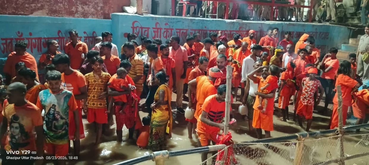 A group of devotees sets off amidst chants of "Har-Har Mahadev."