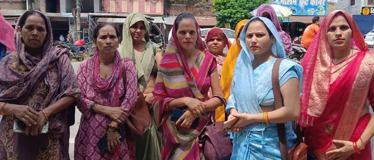 The women accused the officer of hatching a conspiracy.