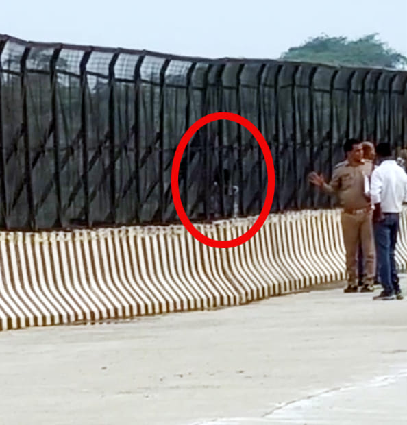 Young man adamant on marrying his girlfriend climbs the railing of Ater Bridge.