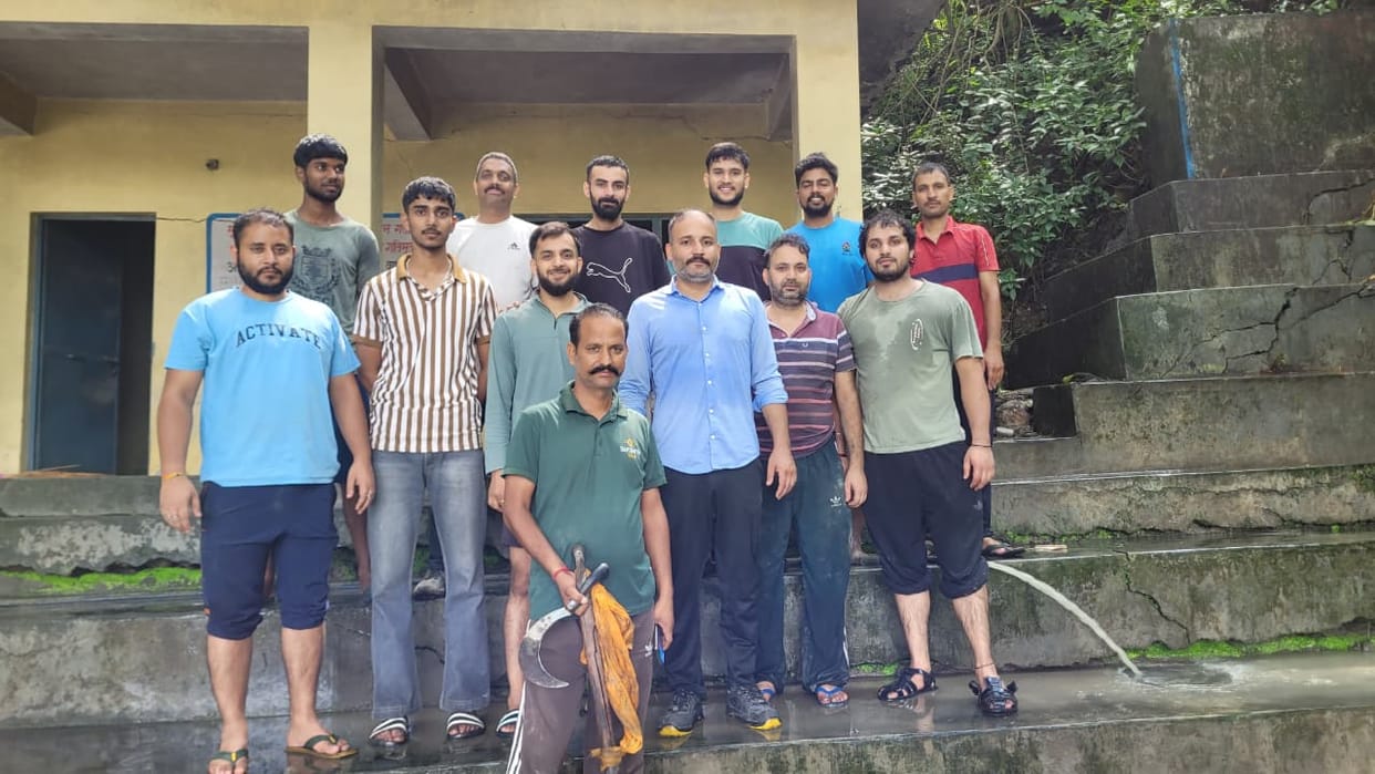 Youth from Barmana step forward to clean the cremation ground.