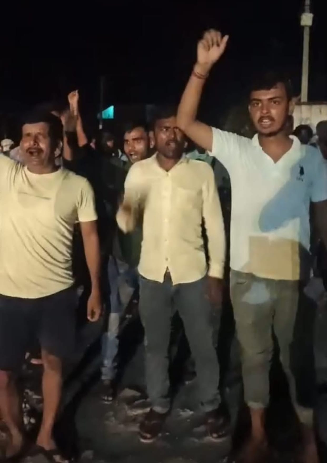 People angry over power outages surrounded the substation