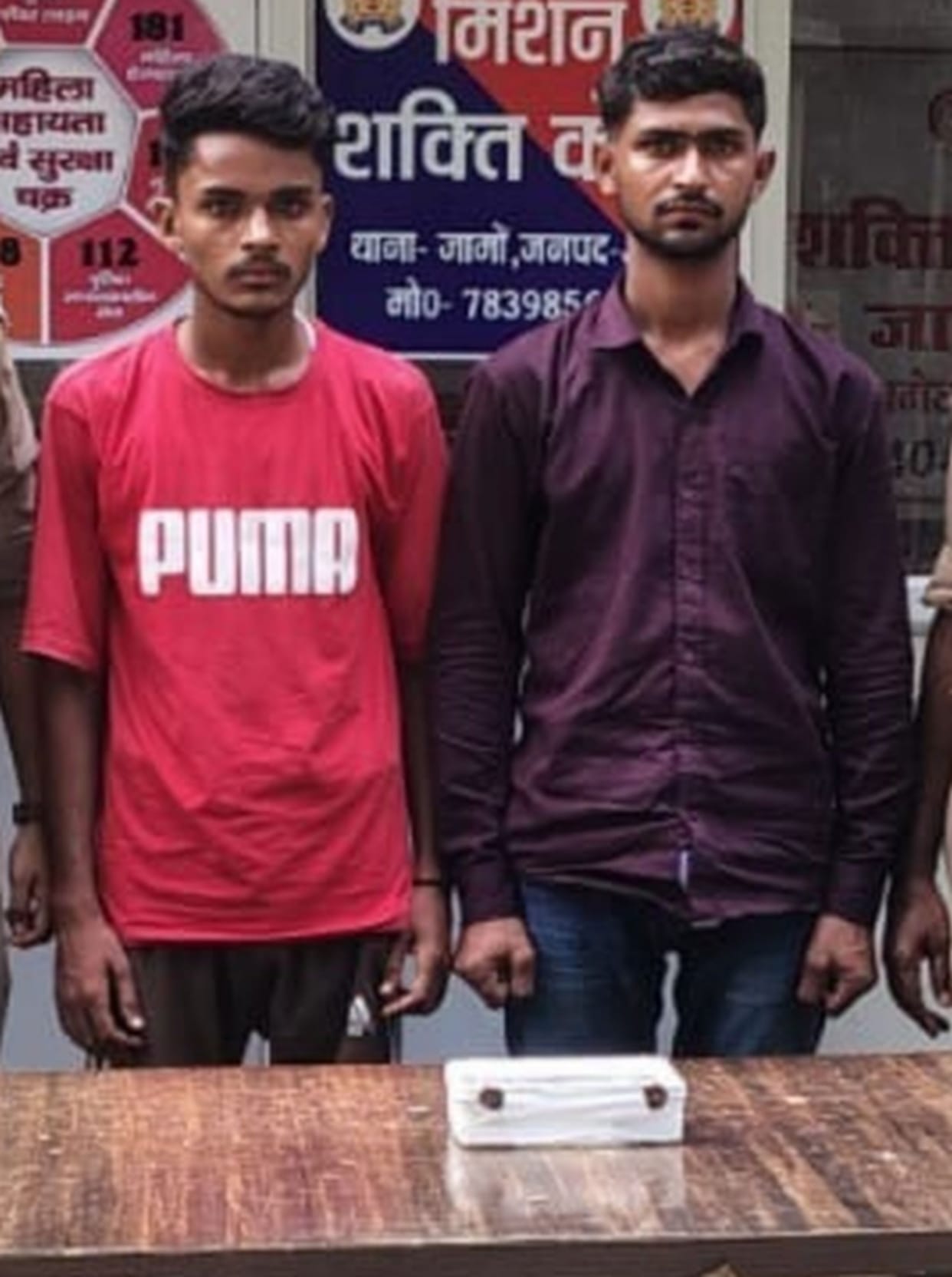 Attempt to snatch mobile at gunpoint; two arrested.