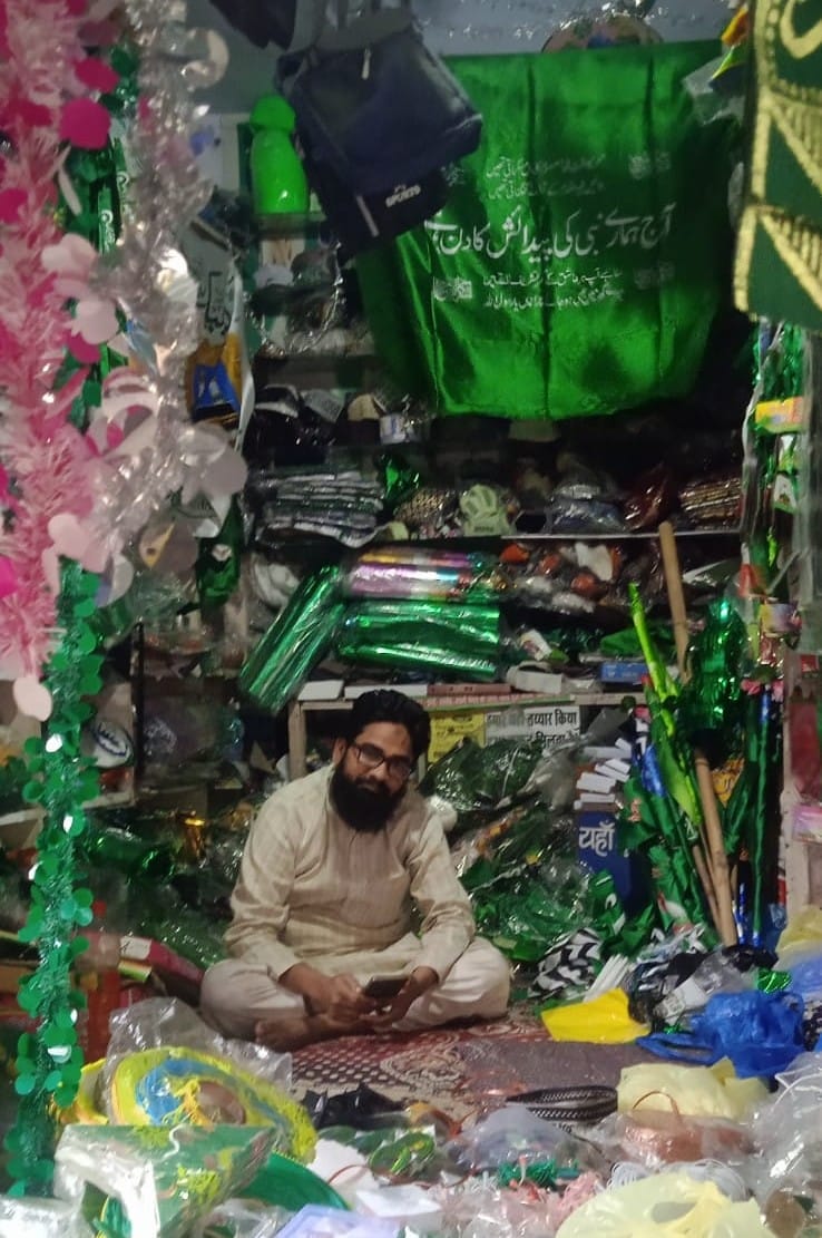 Islamic flags and garlands adorn the market on the occasion of Eid Milad-un-Nabi.