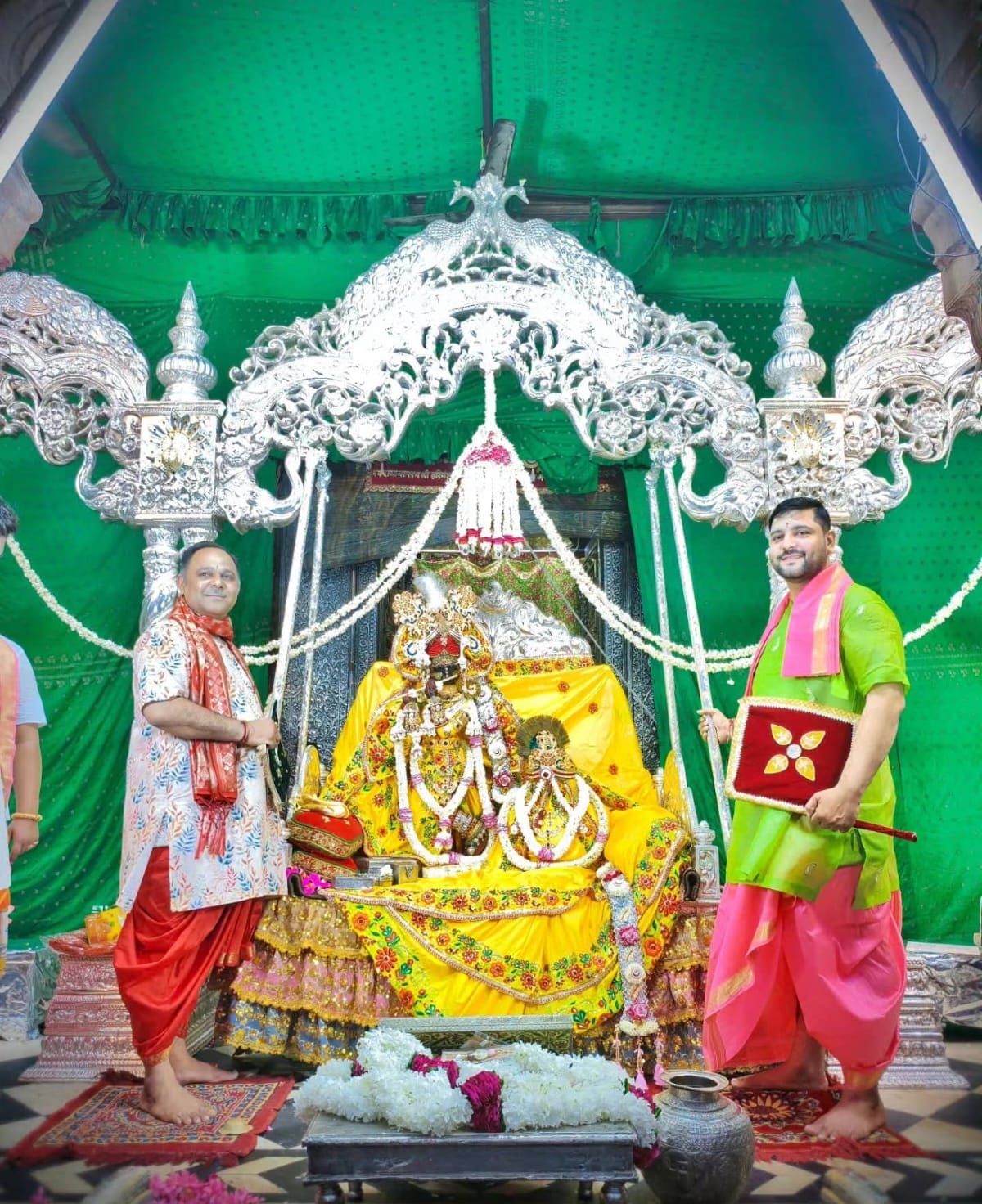 Thakur Radhavallabh Lal seated on a new silver swing worth 4.5 crore