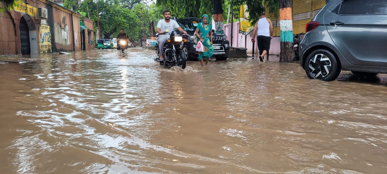 Waterlogging due to two and a half hours of heavy rain; tree falls on GT Road.
