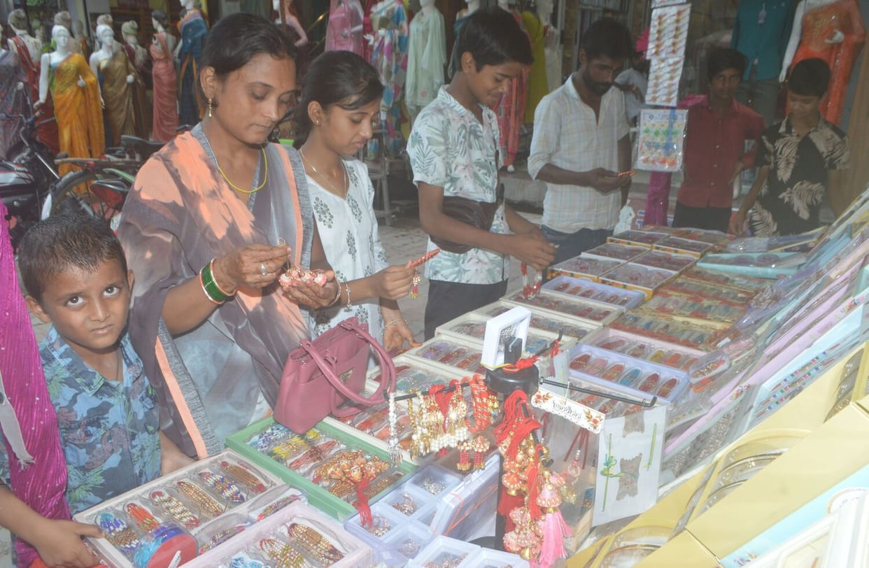 Markets decked out in the sparkle of Rakhis; crowds begin to throng for shopping.