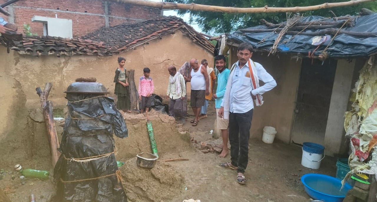 Unbaked brick wall collapses in rain; 10-year-old boy dies after being buried under debris.