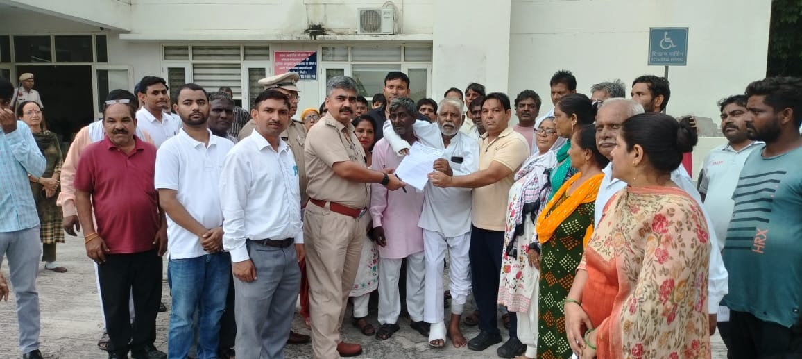 Protest held to demand the arrest of those accused of the alleged attack on an employee leader.