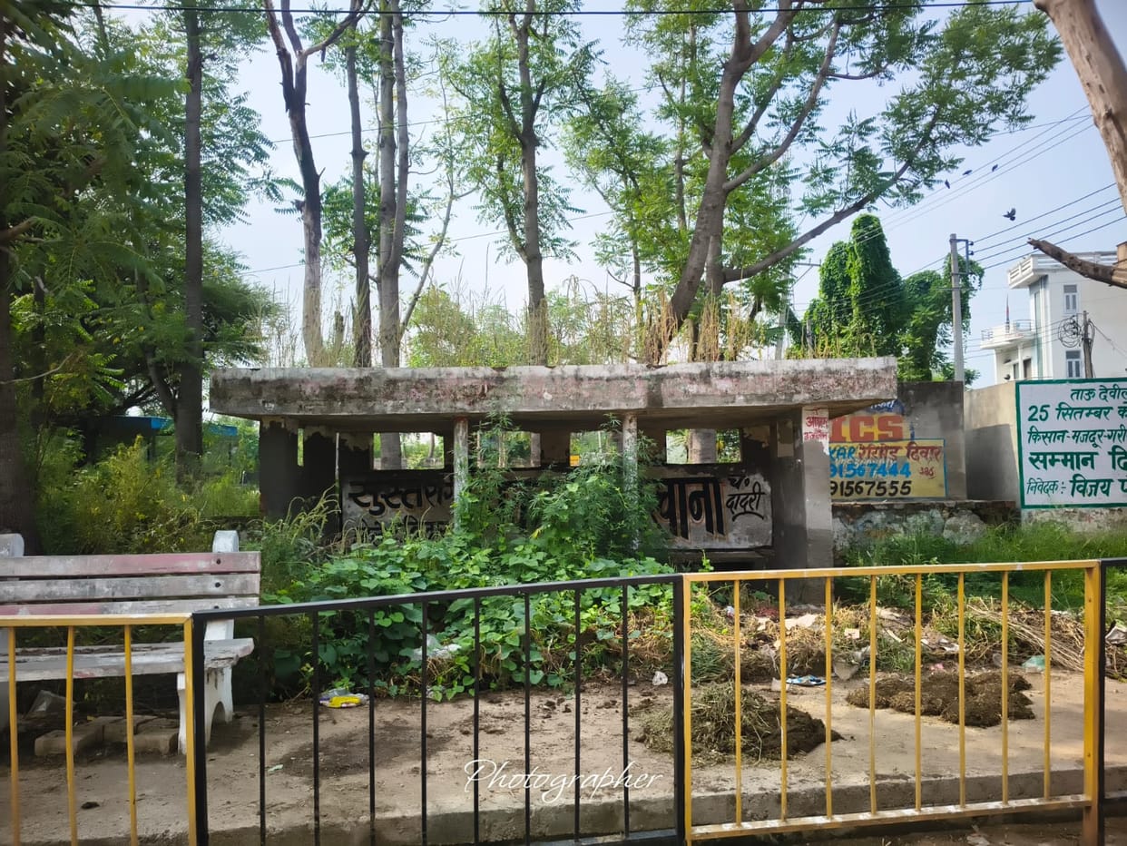 Bus Queue Shelter in poor condition; passengers deprived of basic amenities