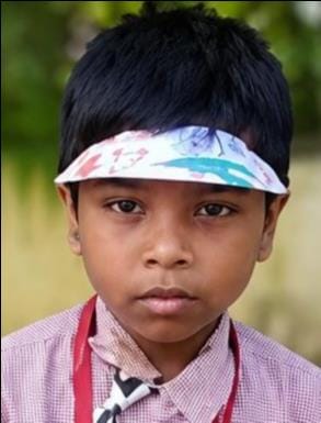 Class 1 student dies after being buried under collapsed mud wall.