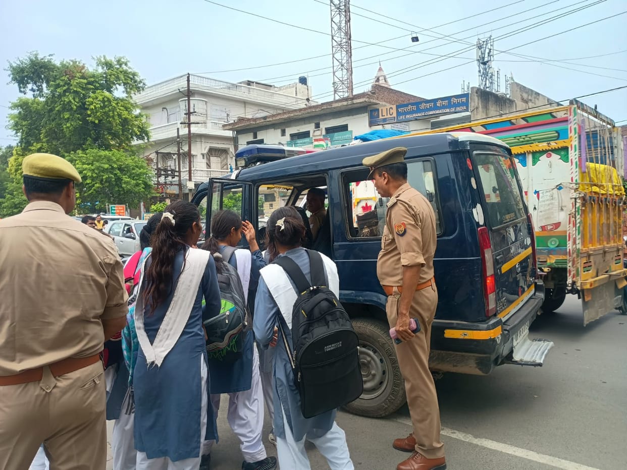 School children taken off e-rickshaw and sent home in police jeep.