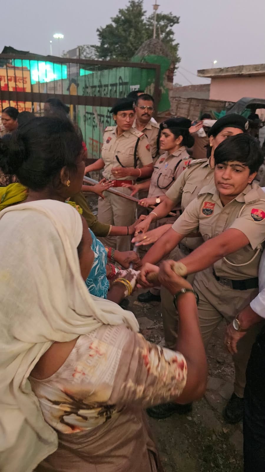 Sanitation workers scuffled with the police.