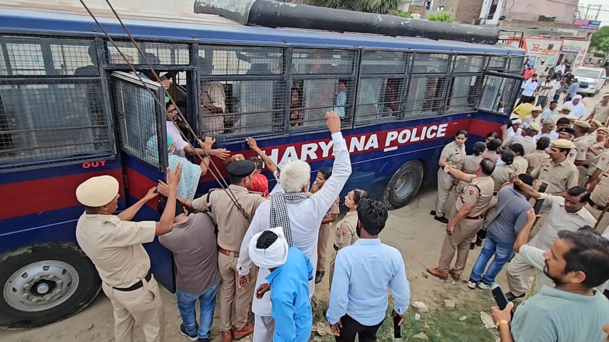 Protests over garbage collection lead to 35 sanitation workers detained; police bus sinks into ditch, workers return