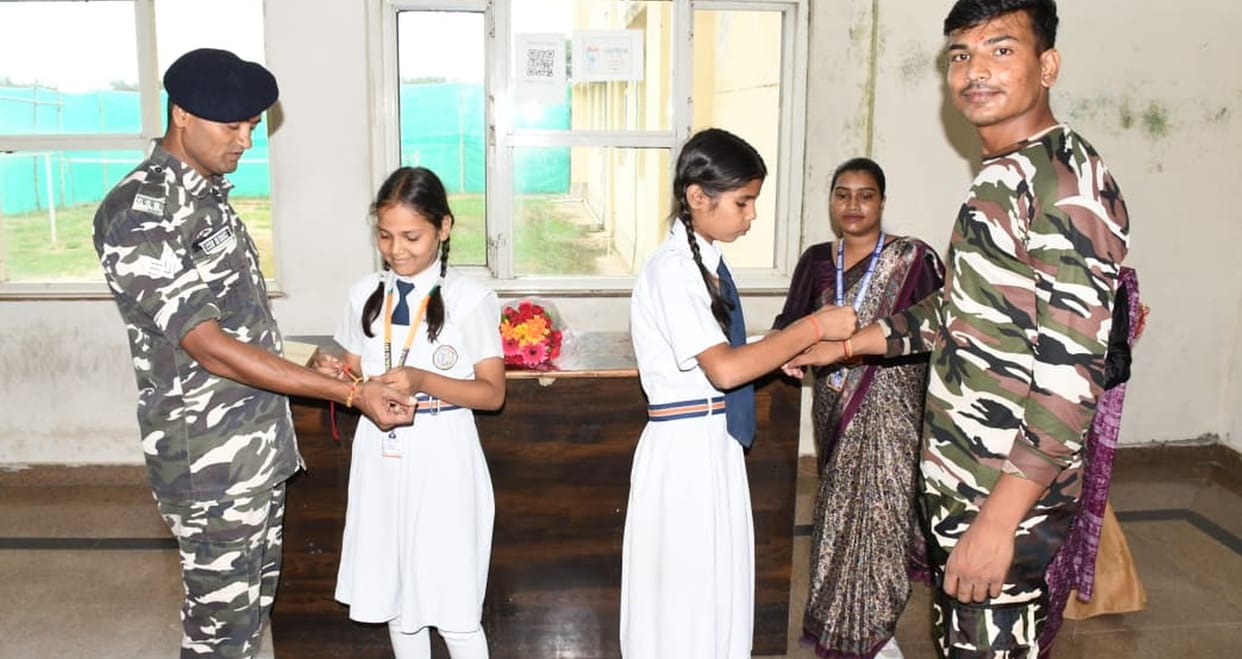 Female students tied *Raksha Sutras* on the wrists of the soldiers