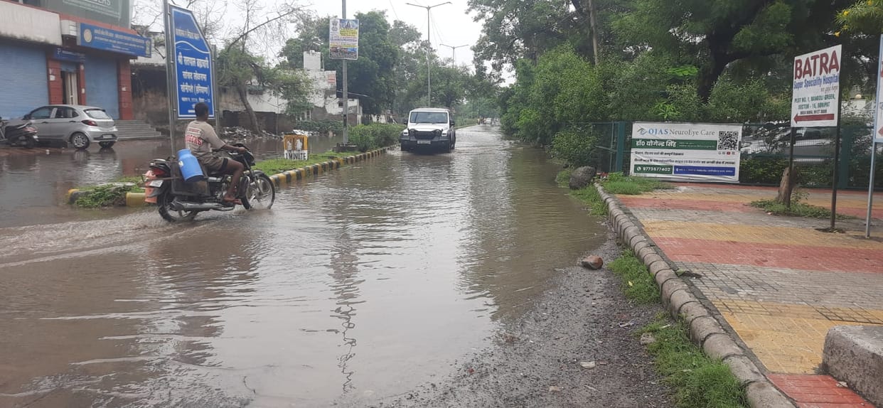 Roads submerged due to 38 mm of rainfall; traffic disrupted.