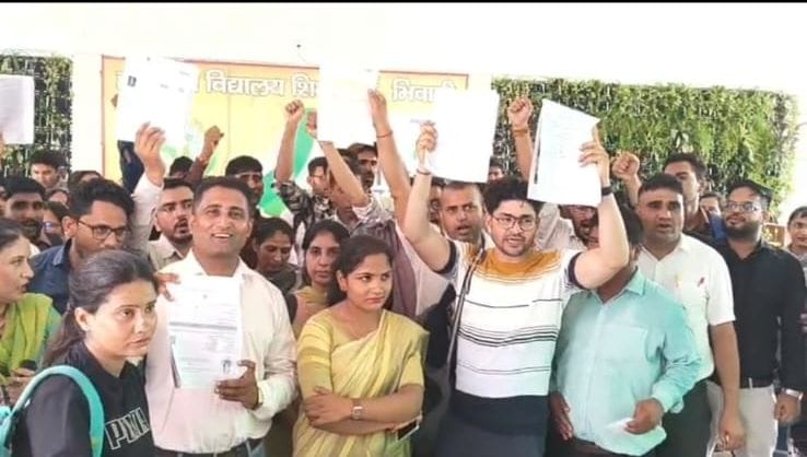 Candidates who missed qualifying by a single mark staged a protest at the board headquarters against the HTET results.
