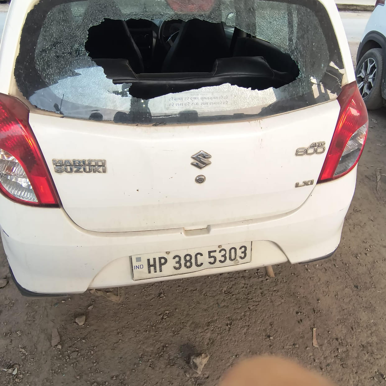 Stone falls on car from under-construction flyover in Jasur; windshield shattered.