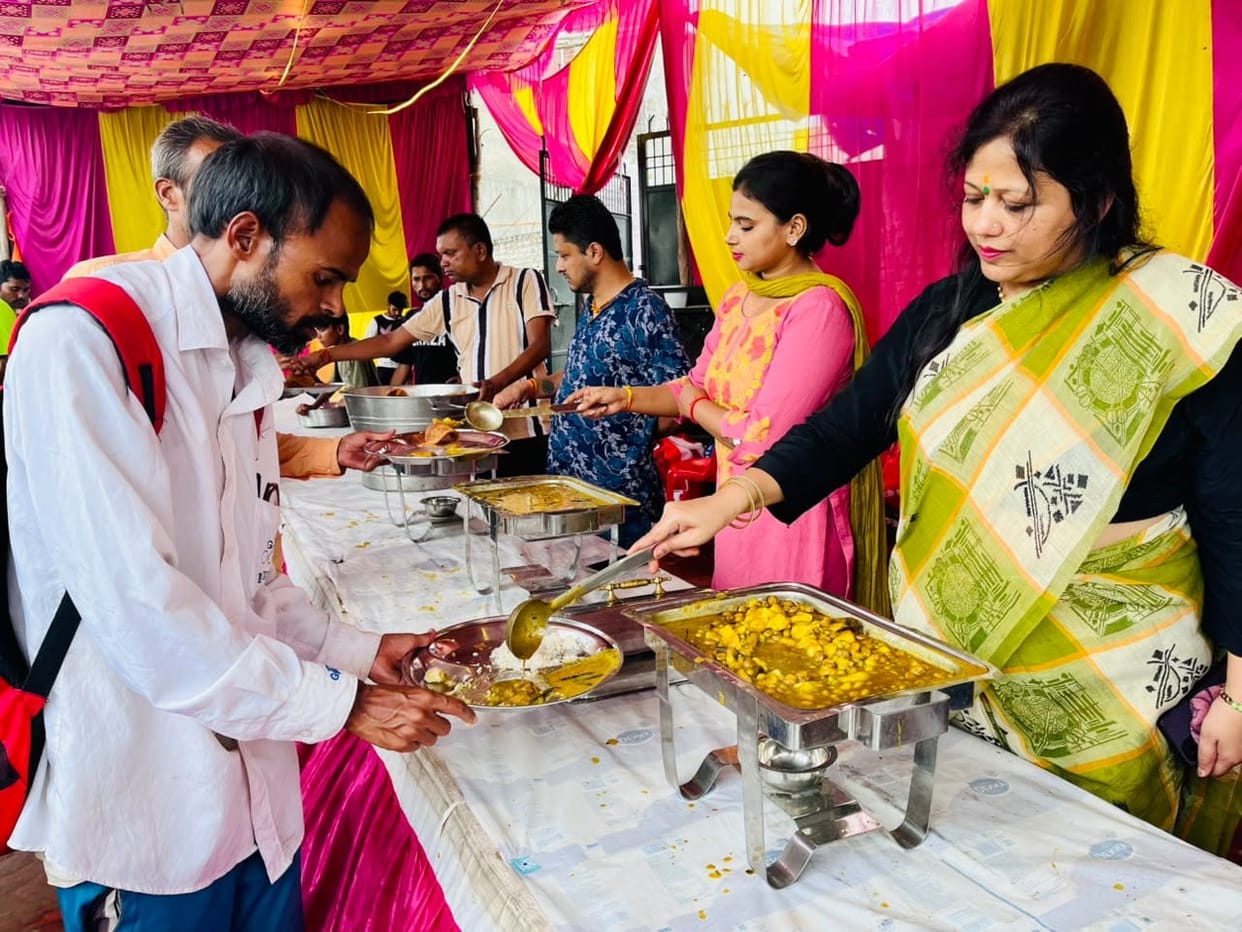 Flowers showered on Kanwar pilgrims; community feast organized.