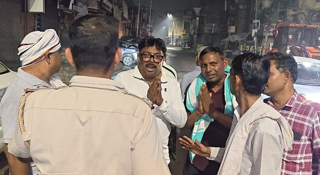 Sanitation workers stopped the police who were getting garbage removed.
